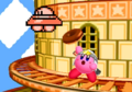 Kirby Fighters Deluxe credits picture, featuring a pixel UFO Kirby giving a donut to a Ninja Kirby
