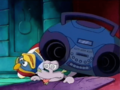 King Dedede and Escargoon are struck by a giant stereo that was tossed at them by the rough-housing tourist kids.
