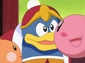 King Dedede tosses Kirby aside after he gets bitten by one of the Scarfies.