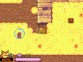 Animal Kirby digging near a bubbled Kirby icon in Kirby: Squeak Squad