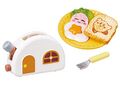 "Breakfast" miniature set from the "Kirby Kitchen" merchandise line, featuring Kirby-themed eggs and toast