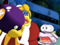 King Dedede tosses out a large bomb for the Kirby-saurus to inhale.