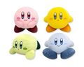 Set of four big plushies of differently colored Kirbys made of corduroy material