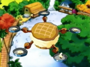 Belly Buster emerges and generates pies to toss at Kirby.
