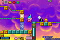 Kirby using a bomb to solve a switch puzzle in Kirby & The Amazing Mirror