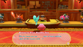 Kirby speaking with Weapons-Shop Waddle Dee