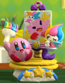 Figurine of Elline trying to teach Kirby how to paint