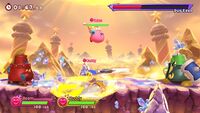 Beam Kirby and Magolor battling Duo Edge in Kirby Fighters 2