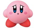 Soft vinyl figure of Kirby looking sad, by Ensky