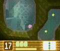 Kirby swims through the underwater channels beneath the palace.
