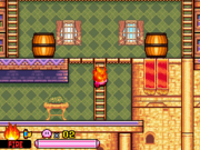 Fire Kirby climbs up to the barrel room
