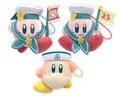 Winter mascot plushies of Kirby and Waddle Dee from "Kirby Mukuizu BON VOYAGE" merchandise line, created for Kirby's 25th Anniversary