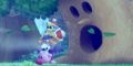 Main Mode credits picture from Kirby's Return to Dream Land, featuring Whispy Woods trying to inhale Kirby and co.