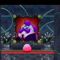 Kirby looking at a magnificent portrait of President Haltmann