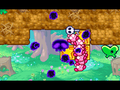 The Kirby getting transported after taking a Skull Key in Stage 6 of Green Grounds.