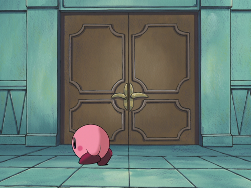 File:KRBaY E051 sad Kirby walking along corridor screenshot.png