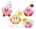 Warmies plushies of Kirby and Waddle Dee, featuring a Maxim Tomato tag