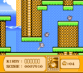 Kirby swims through a winding watery tunnel with sword in hand.