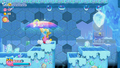 Kirby uses a Prism Shield to defend from the many Pluids aiming to drop on him.