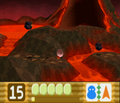 Kirby dodging several Ignus as he enters the volcano in Neo Star - Stage 4