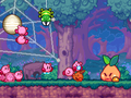 A bunch of foes brawl with the Kirbys as they try to untangle a bigger cobweb cocoon