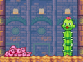 The Kirbys engage Bigger Stactus in the ruins of Sandy Canyon - Stage 3.