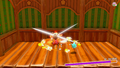 Kirby attacking Mr. Sandbag using Morpho Knight Sword in Kirby and the Forgotten Land