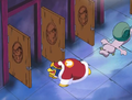 Dedede rushes for a bathroom stall.