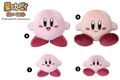 Kirby plushies in sitting and standing poses. Manufactured by San-ei prior to the All Star Collection series.