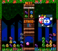 In Kirby's Avalanche, the HUD surrounds two windows, the left of which shows the player's blobs, and the right of which shows the opponent's blobs.