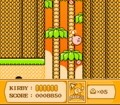Kirby flies up a narrow shaft while protecting himself from falling coconuts.