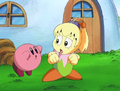Kirby is distracted by a dragonfly on Tiff's head.