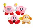 Mascot plushies of Kirby and Waddle Dee with a sparkly texture, featuring a Maxim Tomato