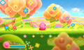 Kirby walks along the floral field.