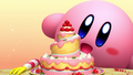 Kirby admiring the cake in front of him in the intro to Kirby's Dream Buffet