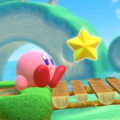Kirby sitting happily next to a Point Star
