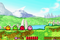 Four Kirbys venture through the first Stage of Vegetable Valley in Kirby: Nightmare in Dream Land.