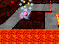The lava strikes back as it rises quickly in an attempt to catch Kirby.