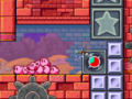 The Kirbys use a Block Bomb to blast away a barricade.
