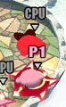 Pink Kirby uses the Big Cake to immobilize red Kirby