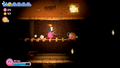 Kirby uses a candle to light his way through a dark place.
