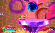 Kirby inspects his sword at the start of the stage.