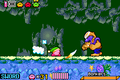 Kirby battles Bonkers in Olive Ocean, in Kirby & The Amazing Mirror