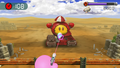 Kirby starts destroying the tank after shooting down Kabula.