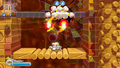 Magolor uses an Upward Revolution Flame to clear out the first Bomb Block.