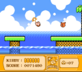 Kirby using the Parasol ability to float through the air in Kirby's Adventure