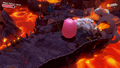 Kirby using Water-Balloon Mouth to break the lava balls before they hit the ground