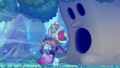 Main Mode credits picture from Kirby's Return to Dream Land Deluxe, featuring Whispy Woods trying to inhale Kirby and co.