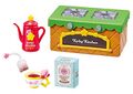 "Cooking stove" miniature set from the "Kirby Kitchen" merchandise line, featuring Kirby-themed tea cup and box