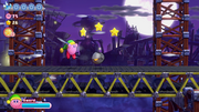 Kirby leaps over a Degout on the conveyor belt.